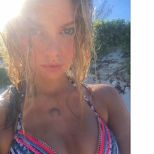 Stella Maxwell in a bikini taking a selfie