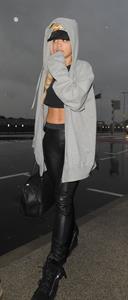 Rita Ora catches a flight at Heathrow Airport in London (27.06.2013) 