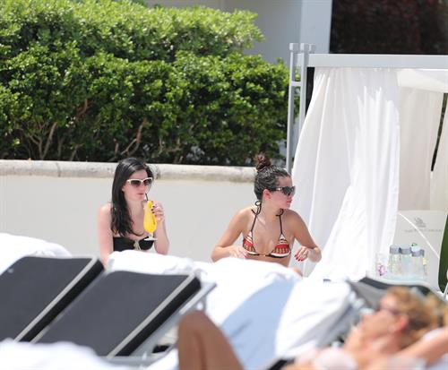 Selena Gomez in bikini by a hotel pool in Miami 5/11/13 
