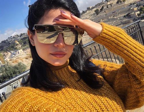 Emeraude Toubia taking a selfie