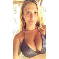 Charlotte in a bikini taking a selfie