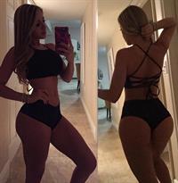 Valeria Orsini in a bikini taking a selfie and - ass