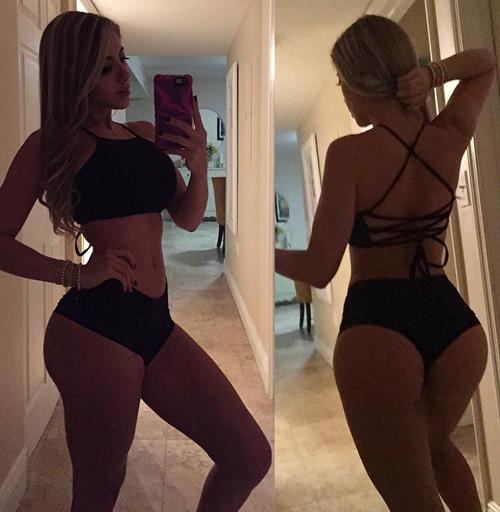 Valeria Orsini in a bikini taking a selfie and - ass