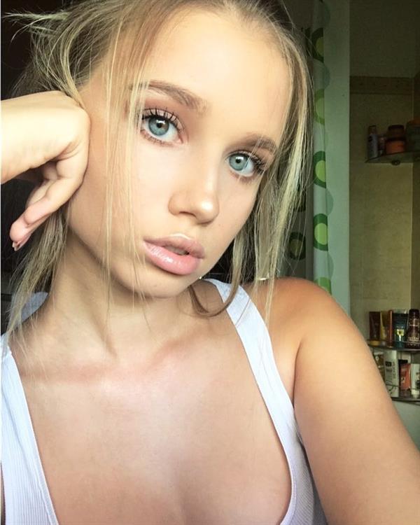 Polina Malinovskaya taking a selfie