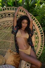 Putri Cinta in 'Irresistible Impulse' for Playboy