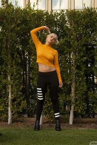 Peach Kennedy In Ripped Jeans