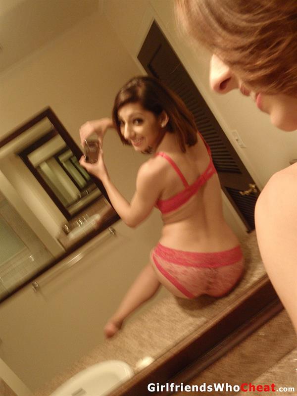 Lexi Bloom in lingerie taking a selfie