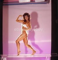 Rachel McLish in a bikini