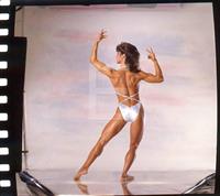 Rachel McLish in a bikini - ass