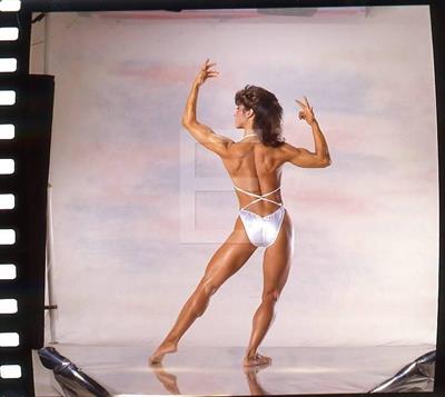 Rachel McLish in a bikini - ass