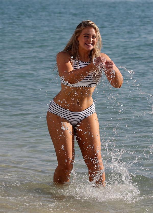 Iskra Lawrence in a swimsuit on Miami beach doing a photoshoot for Aerie on 11/26/2018