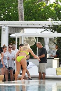 Iskra Lawrence in a swimsuit on Miami beach doing a photoshoot for Aerie on 11/26/2018