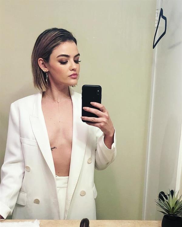 Lucy Hale taking a selfie