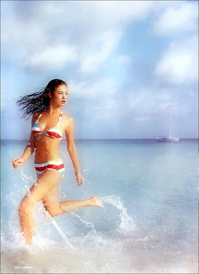 Olga Kurylenko in a bikini