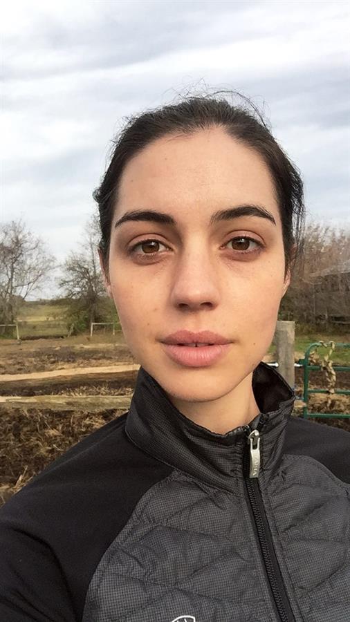 Adelaide Kane taking a selfie