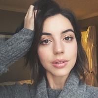 Adelaide Kane taking a selfie