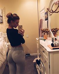 Daisy Keech taking a selfie and - ass