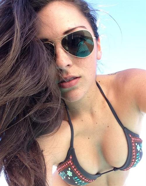 Elizabeth Barela in a bikini taking a selfie