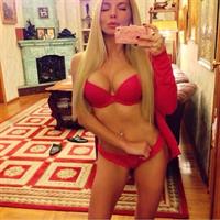 Alena Politukha in a bikini in lingerie taking a selfie