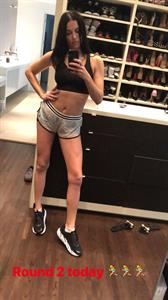 Adriana Lima taking a selfie