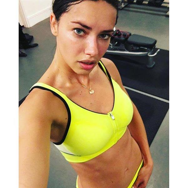 Adriana Lima taking a selfie