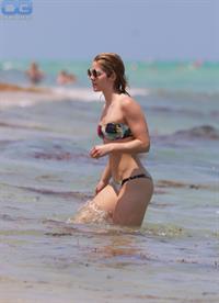 Emily Bett Rickards in a bikini