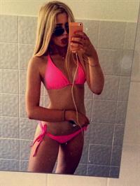 Anonymous in a bikini taking a selfie