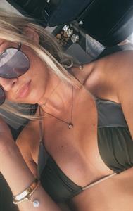 Anonymous in a bikini taking a selfie