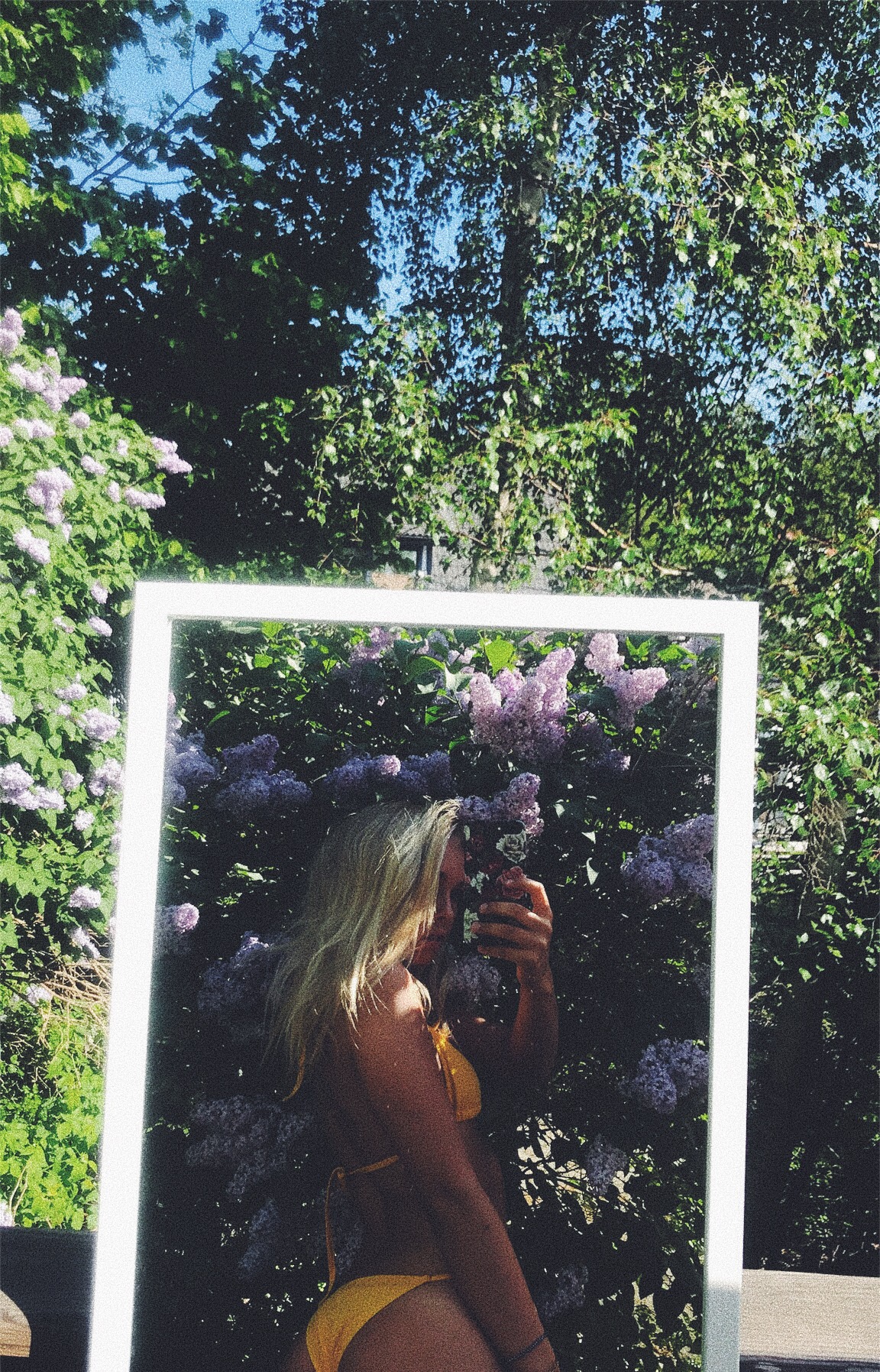 stina jonsson in a bikini taking a selfie