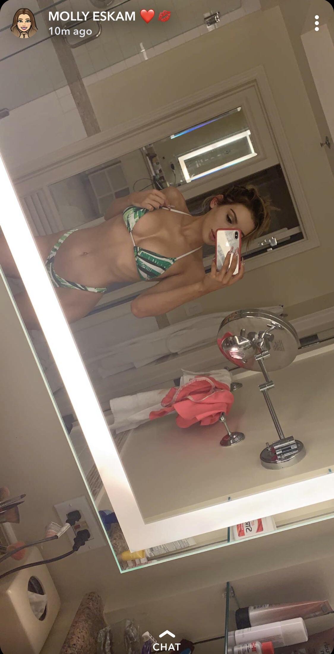 Anonymous in a bikini taking a selfie