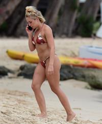 Gabby Allen sexy bikini photos seen by paparazzi on a beach in Barbados she has a nice ass.








