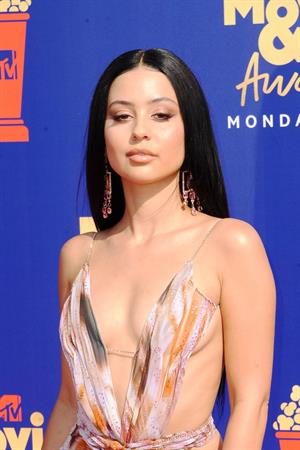 Alexa Demie braless boobs in a revealing dress on the red carpet at the 2019 MTV Movie and TV Awards.






















