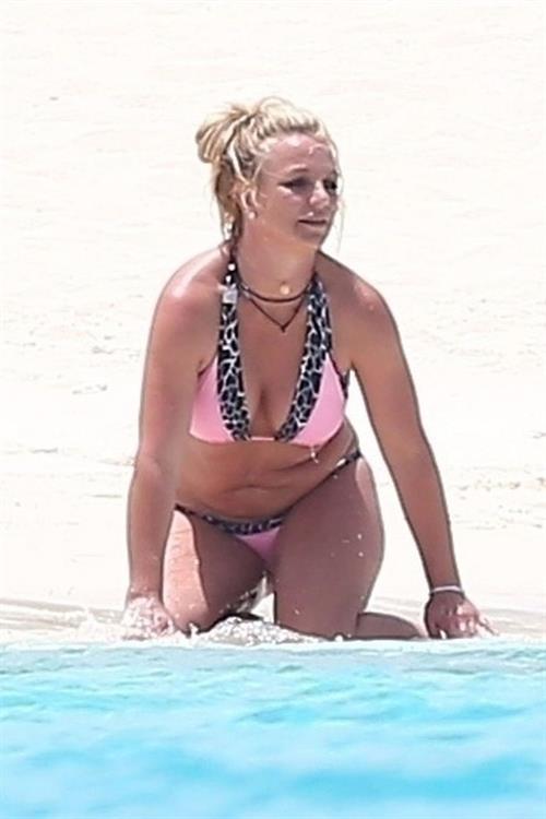 Britney Spears Bikini Pictures Britney Spears in a sexy bikini on the beach seen by paparazzi.
