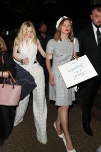 Ellie Bamber braless boobs while wearing basically a scarf as a top showing side boob cleavage.








