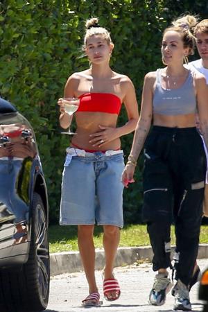 Hailey Baldwin Bieber in a sexy red bikini out with Justin Bieber seen by paparazzi.




