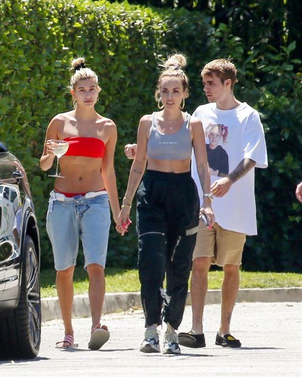 Hailey Baldwin Bieber in a sexy red bikini out with Justin Bieber seen by paparazzi.




