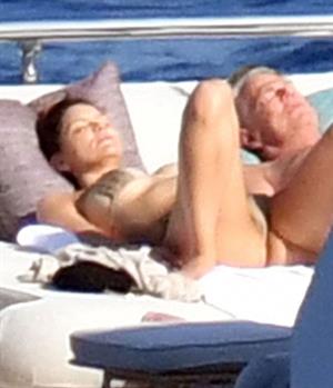 Katharine McPhee Bikini Pictures Katharine McPhee nude big boobs caught topless by paparazzi tanning.