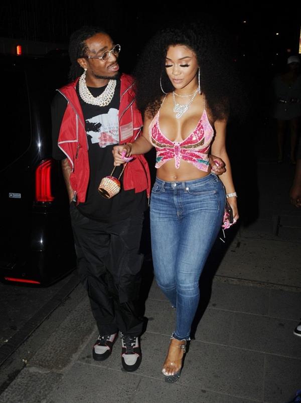 Saweetie sexy boobs showing nice cleavage seen by paparazzi with Quavo.












