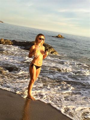 Ella Rose Nude Pictures Ella Rose in a topless beach photoshoot