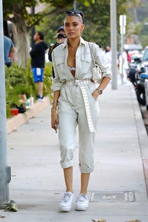 Madison Beer showing off her boobs in a sexy revealing top seen by paparazzi.




