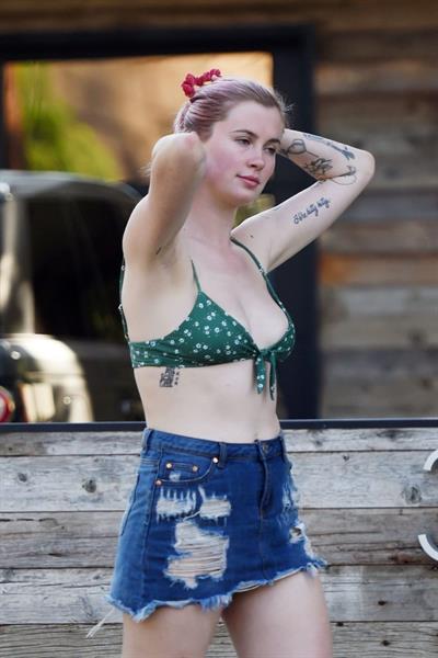 Ireland Baldwin sexy in a bikini top seen by paparazzi showing some nice cleavage.








