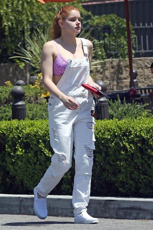 Ariel Winter Pictures Ariel Winter areola peek in a sexy bikini top seen by paparazzi buying liquor.