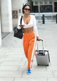 Maya Jama sexy in a crop top showing some nice cleavage seen by paparazzi.










