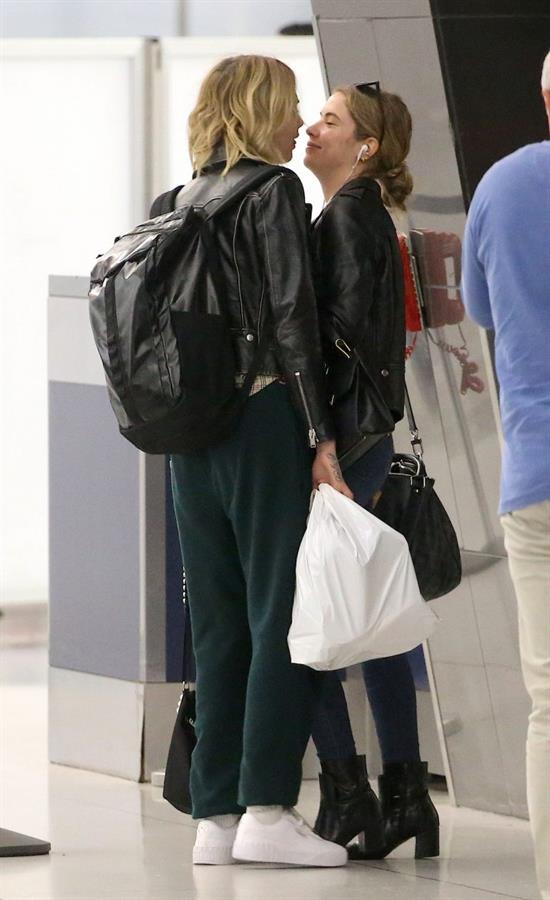 Cara Delevingne and Ashley Benson kissing at the airport.






















