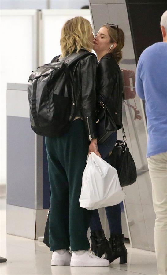 Cara Delevingne and Ashley Benson kissing at the airport.






















