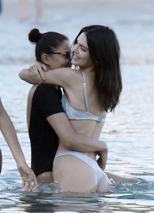 Kendall Jenner Bikini Pictures Kendall Jenner sexy ass in a thong bikini seen by paparazzi in the water at the beach.