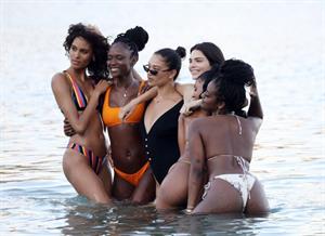 Kendall Jenner sexy ass in a thong bikini seen by paparazzi in the water at the beach.




























