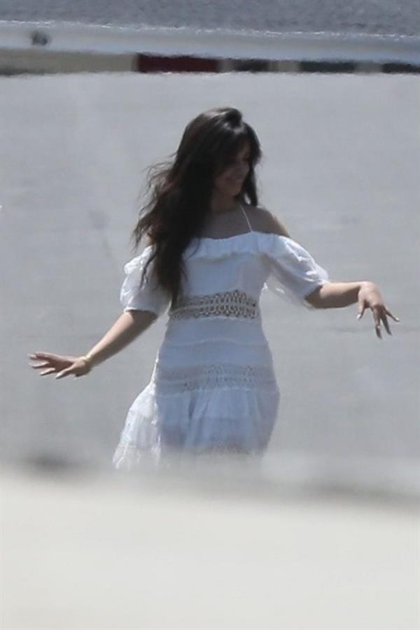 Camila Cabello sexy ass in a white dress seen with Shawn Mendes by paparazzi.


