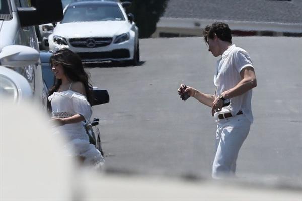 Camila Cabello sexy ass in a white dress seen with Shawn Mendes by paparazzi.


