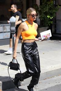 Hailey Bieber braless tits pokies seen by paparazzi in a halter top.





